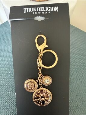True Religion Gold Tone Logo Charm Key Card Holder Accent